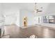Spacious living room features vaulted ceilings, fireplace, and wood-look flooring at 1911 Hobson Dr, Henderson, NV 89074