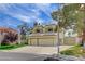 Charming two-story home with a two-car garage, desert landscape and private gated entrance at 2073 Sapphire Valley Ave, Henderson, NV 89074