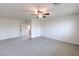 Spacious bedroom featuring plush carpet and ceiling fan at 2300 Sky Island Dr, Henderson, NV 89002