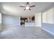 Spacious open living area featuring a ceiling fan and tiled flooring at 2300 Sky Island Dr, Henderson, NV 89002