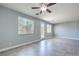 Bright living room with tile flooring, recessed lights, ceiling fan, and natural light at 2300 Sky Island Dr, Henderson, NV 89002