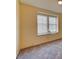 Bedroom with carpeted floors, a window, and neutral paint at 2352 Pickwick Dr # 85, Henderson, NV 89014