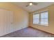 Bedroom with neutral walls and carpet and bright natural light at 2352 Pickwick Dr # 85, Henderson, NV 89014