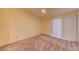 Cozy bedroom featuring carpet flooring and a window with blinds for natural light at 2352 Pickwick Dr # 85, Henderson, NV 89014