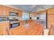 Spacious kitchen with stainless steel appliances and wooden cabinetry, perfect for cooking and entertaining at 2352 Pickwick Dr # 85, Henderson, NV 89014