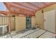Private patio with lattice cover, fenced area, and an air conditioning unit at 2352 Pickwick Dr # 85, Henderson, NV 89014