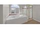 Bathroom featuring a large window and shower stall at 2405 Esteem Ridge Dr, Henderson, NV 89052