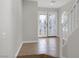 Bright foyer showcasing tile flooring and decorative glass double doors at 2405 Esteem Ridge Dr, Henderson, NV 89052