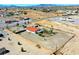 Aerial view showcases the property, neighboring houses, and desert landscape at 2801 Peggy Ave, Pahrump, NV 89048