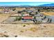 An aerial shot of a home with desert landscape, and mountain views at 2801 Peggy Ave, Pahrump, NV 89048