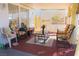 A view of the covered patio with comfortable chairs and natural light at 2801 Peggy Ave, Pahrump, NV 89048