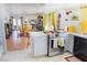 Open concept kitchen with stainless steel appliances, countertops, and view of the dining and living areas at 2801 Peggy Ave, Pahrump, NV 89048