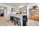 Cozy kitchen features stainless steel appliances and a breakfast bar with seating at 2983 Juniper Hills Blvd # 102, Las Vegas, NV 89142