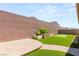 Lovely backyard features artificial turf, pavers, and a putting green for outdoor recreation at 3391 Stone View Ave, Henderson, NV 89044