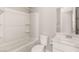 Clean bathroom featuring a shower-tub combination, white vanity, and neutral decor at 3391 Stone View Ave, Henderson, NV 89044