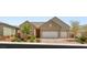 Charming single-story home with stone accents, three-car garage, and well-manicured front yard at 3391 Stone View Ave, Henderson, NV 89044