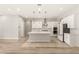 Bright kitchen featuring a large island, modern appliances, and ample counter space at 3391 Stone View Ave, Henderson, NV 89044