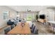 Staged living room with modern furniture, open floor plan, and seamless indoor-outdoor living at 3391 Stone View Ave, Henderson, NV 89044