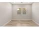 Clean and bright office space with hardwood floors, and a neutral color palette at 3391 Stone View Ave, Henderson, NV 89044