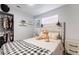Comfortable bedroom boasts a tidy closet and a cozy sleeping space at 405 Box Elder Way, Henderson, NV 89015