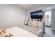 Bright bedroom showcasing a dresser and mounted television at 405 Box Elder Way, Henderson, NV 89015