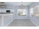 Bright dining area with white trim, gray walls and vinyl wood flooring at 4820 Grey Wolf Ln # 101, Las Vegas, NV 89149