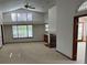 Bright living room with high vaulted ceilings, a fireplace, and lots of natural light at 5401 Painted Sunrise Dr, Las Vegas, NV 89149