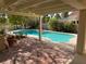 Backyard pool view from covered patio, showcasing the pool area and outdoor living space at 5401 Painted Sunrise Dr, Las Vegas, NV 89149