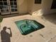 Cozy inground spa with surrounding concrete deck, ideal for relaxation and unwinding at 5401 Painted Sunrise Dr, Las Vegas, NV 89149
