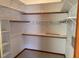Walk-in closet with built-in shelving and ample storage space for organization at 5401 Painted Sunrise Dr, Las Vegas, NV 89149