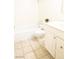 Bathroom featuring tiled floor, a tub/shower and a white vanity at 605 S Royal Crest Cir # 8, Las Vegas, NV 89169