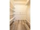Walk-in closet featuring plenty of shelves and room for clothes and storage at 605 S Royal Crest Cir # 8, Las Vegas, NV 89169