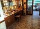 Bathroom featuring tiled floor and long vanity with wood cabinets at 6325 Burgundy Way, Las Vegas, NV 89107