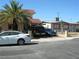 Inviting property showcasing a well-maintained front yard, driveway, and charming facade at 6325 Burgundy Way, Las Vegas, NV 89107