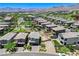 Aerial view of a contemporary home with a beautiful backyard setup at 689 Rogue Wave St, Las Vegas, NV 89138