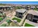 Stunning backyard featuring an outdoor lounge area, pergola, and turf at 689 Rogue Wave St, Las Vegas, NV 89138