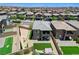 Aerial perspective showcases a home with a modern exterior, landscaped yard, and inviting outdoor living space at 689 Rogue Wave St, Las Vegas, NV 89138