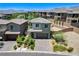 A modern two-story home with low-maintenance landscaping, mountain views, and a paver driveway at 689 Rogue Wave St, Las Vegas, NV 89138