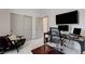 Well-lit office space featuring a sleek desk setup, modern furniture, and neutral tones at 689 Rogue Wave St, Las Vegas, NV 89138