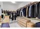 Spacious walk-in closet with lots of hanging space and built in dresser drawers at 689 Rogue Wave St, Las Vegas, NV 89138