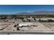 Residential lot features a home, RV, truck, and mountain views at 7130 Bilpar Rd, Las Vegas, NV 89131