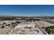 Property with home, vehicles, and desert landscape close to highway at 7130 Bilpar Rd, Las Vegas, NV 89131