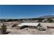 Spacious single-story home with a large yard, RV parking, and mountain views at 7130 Bilpar Rd, Las Vegas, NV 89131