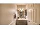 Charming bathroom with vanity, decorative mirror, neutral paint, and modern fixtures at 7329 Restful Springs Ct, Las Vegas, NV 89128