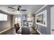 Dining room featuring a modern table, seating for six, and access to the kitchen at 7329 Restful Springs Ct, Las Vegas, NV 89128