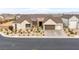 Lovely single-story home boasting desert landscaping, a brick driveway, and a two-car garage at 8838 Sorrel Hills Ct, Las Vegas, NV 89113