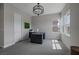 Bright home office featuring a sleek desk, large windows, and ample natural light at 8838 Sorrel Hills Ct, Las Vegas, NV 89113