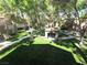 A beautiful courtyard with a gazebo, lush green grass, and mature trees at 9000 Las Vegas Blvd # 2101, Las Vegas, NV 89123