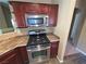Kitchen featuring stainless steel oven and microwave with granite countertops at 9000 Las Vegas Blvd # 2101, Las Vegas, NV 89123