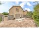 Back of house with a concrete patio and a low block fence at 9626 Grapeland Ave, Las Vegas, NV 89148